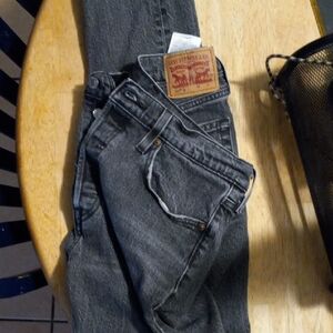 Levi's  Charcoal Relaxed Jeans 28x27 Raw Hem.